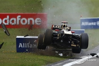 Heidfeld flies through the air after being hit by Buemi