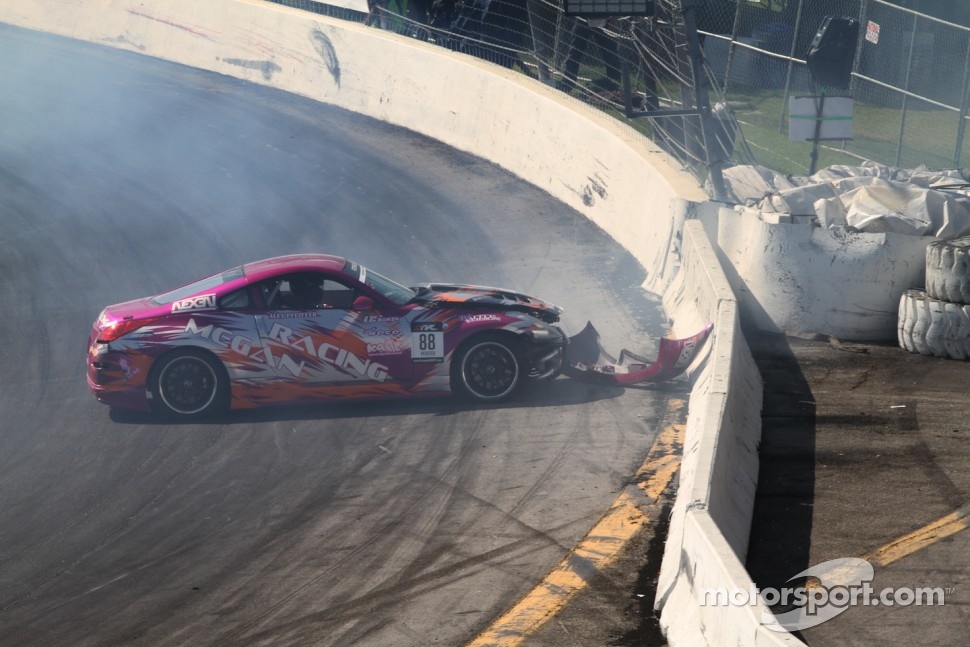 Alex Pfeiffer crashes his Megan Racing Nissan 350Z