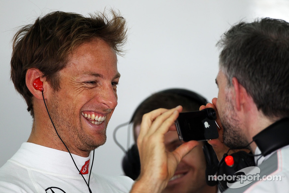 Jenson Button, McLaren with Adam Cooper, McLaren Press Officer