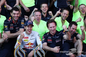 Race winner Sebastian Vettel, Red Bull Racing celebrates with Christian Horner, Red Bull Racing Team Principal and the team