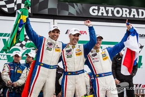 P class victory lane: class and overall winners Christian Fittipaldi, Joao Barbosa and Sébastien Bourdais
