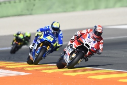 Andrea Dovizioso, Ducati Team; Aleix Espargaro, Team Suzuki MotoGP