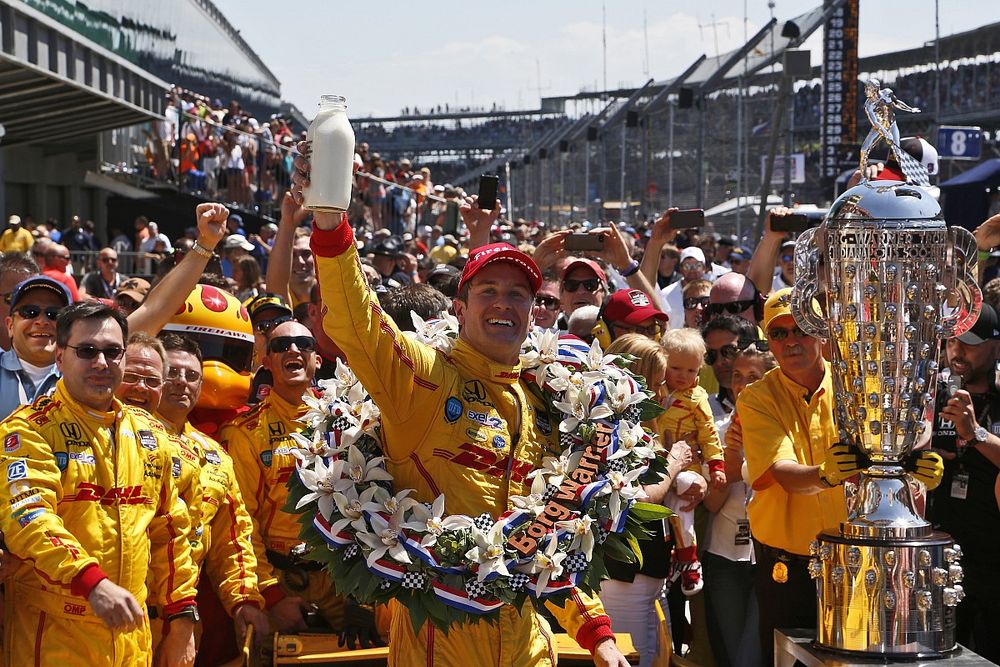 Ryan Hunter-Reay celebrates with milk in victory lane