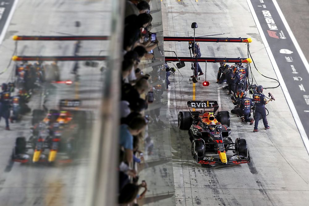 Sergio Perez, Red Bull Racing RB18, makes a pit stop