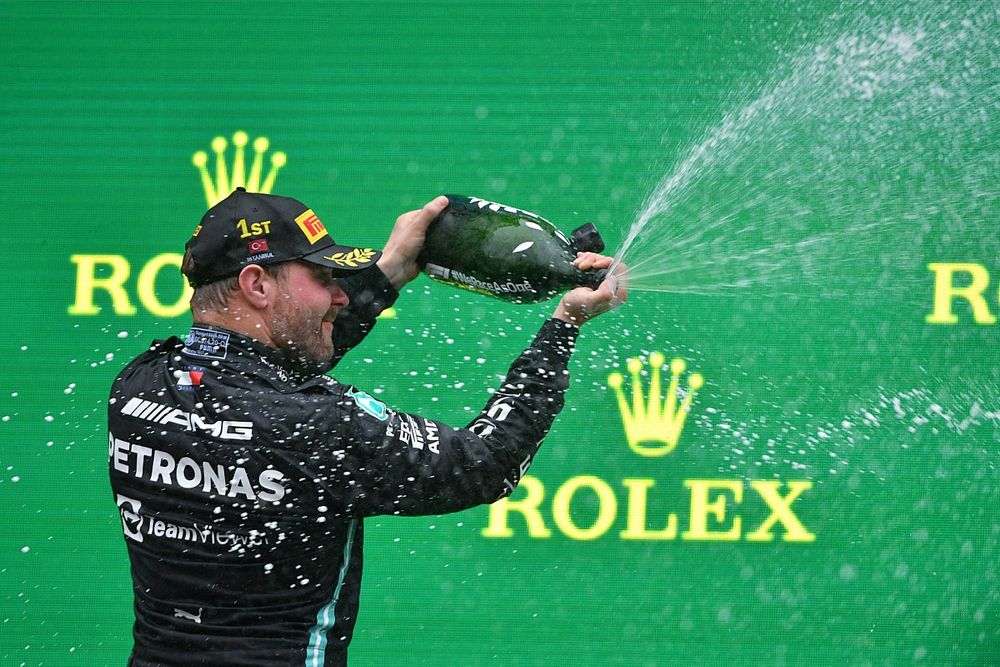 Valtteri Bottas, Mercedes, 1st position, sprays the victory Champagne