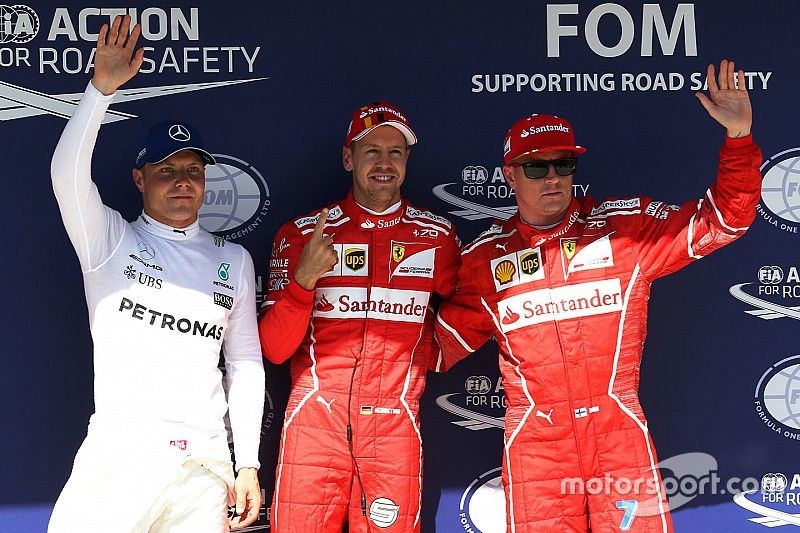 Valtteri Bottas, Mercedes AMG F1 W08, ganador de la pole Sebastian Vettel, Ferrari y Kimi Raikkonen,