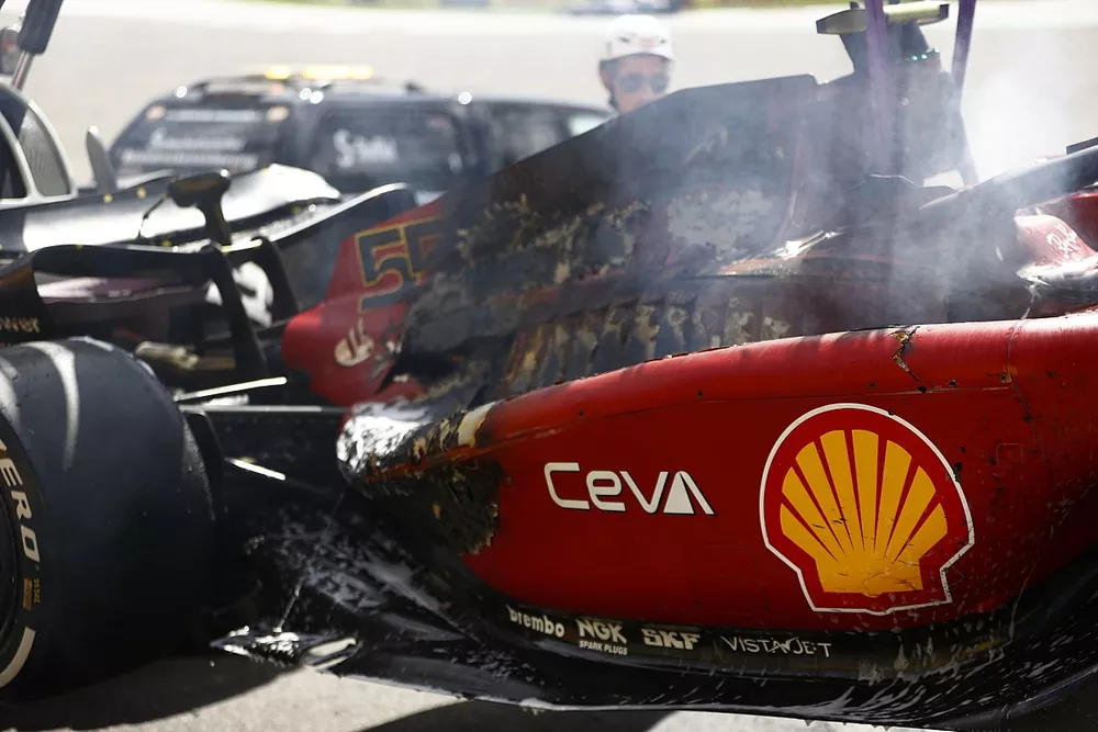 The burned out car of Carlos Sainz, Ferrari F1-75, after a fire causes his retirement