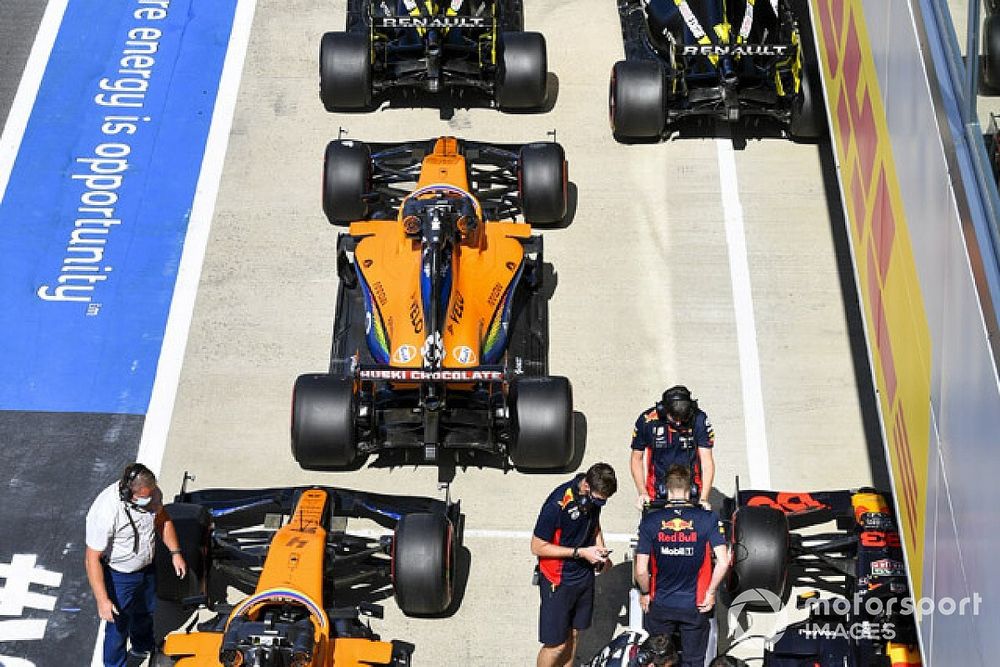 The cars of Daniel Ricciardo, Renault F1 Team R.S.20, Esteban Ocon, Renault F1 Team R.S.20, Carlos Sainz Jr., McLaren MCL35, Lando Norris, McLaren MCL35, and Max Verstappen, Red Bull Racing RB16, in Parc Ferme after Qualifying