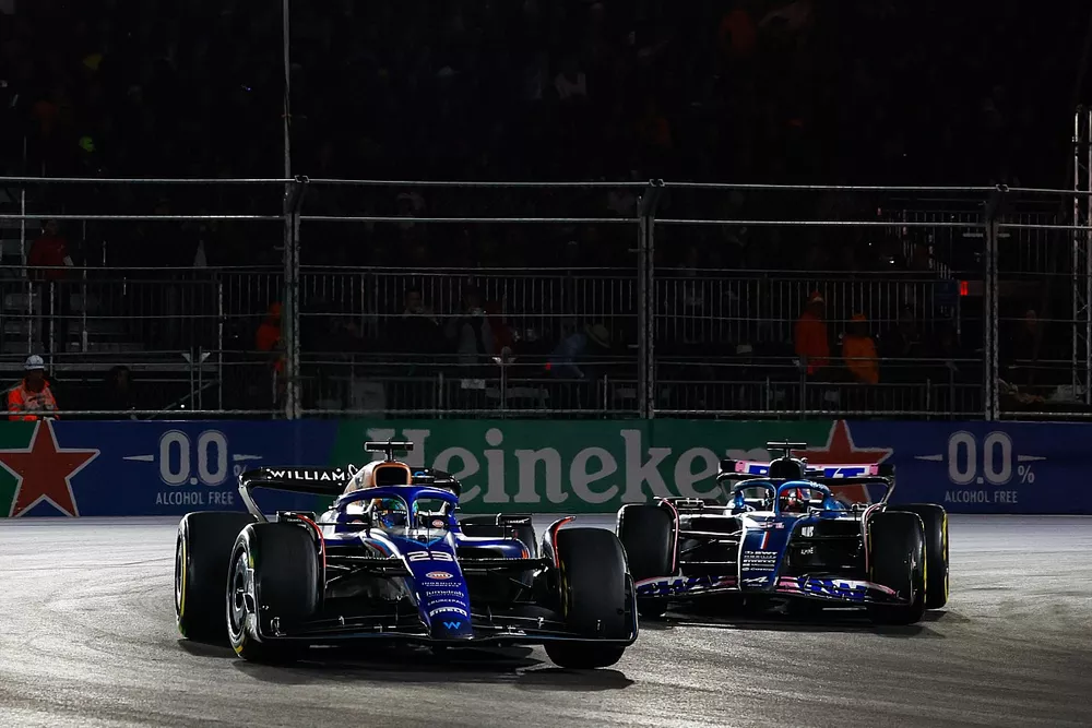 Alex Albon, Williams FW45, leads Esteban Ocon, Alpine A523
