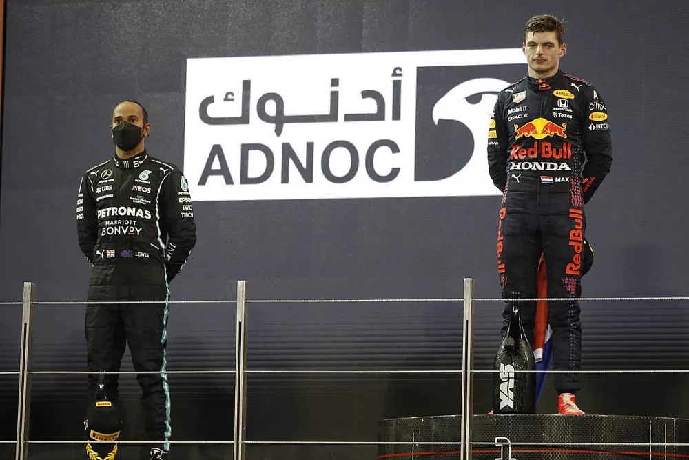Lewis Hamilton, Mercedes, 2nd position, Max Verstappen, Red Bull Racing, 1st position, on the podium