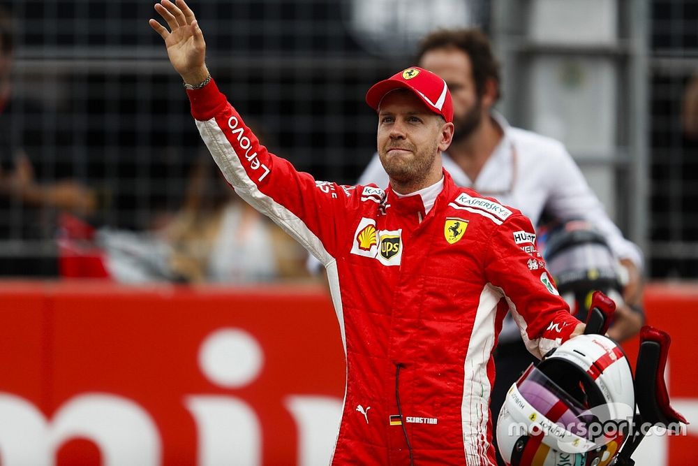 Sebastian Vettel, Ferrari, celebrates his pole position