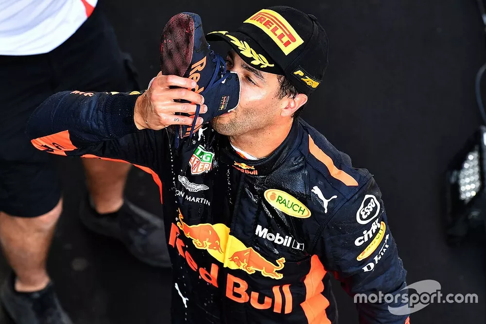 Race winner Daniel Ricciardo, Red Bull Racing celebrates with a shoey on the podium