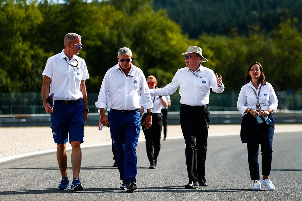 FIA personnel walk the track, including Niels Wittich, Race Director, FIA