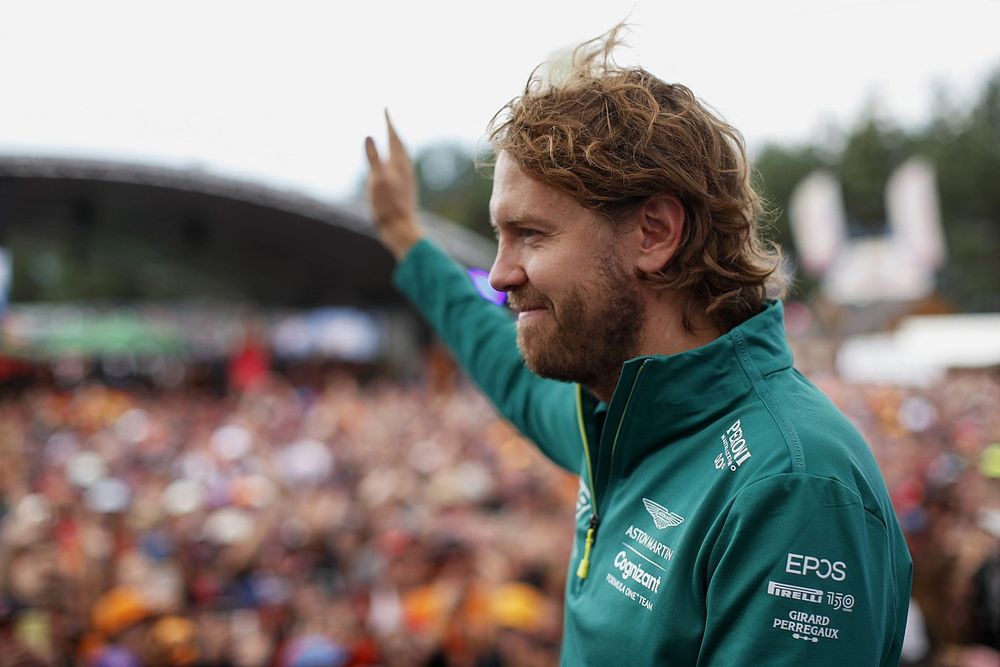 Sebastian Vettel, Aston Martin, waves to fans