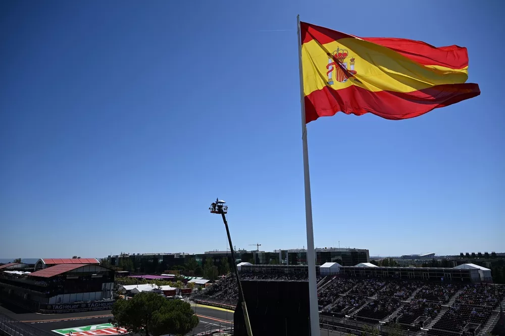 The Spanish flag flies over the circuit