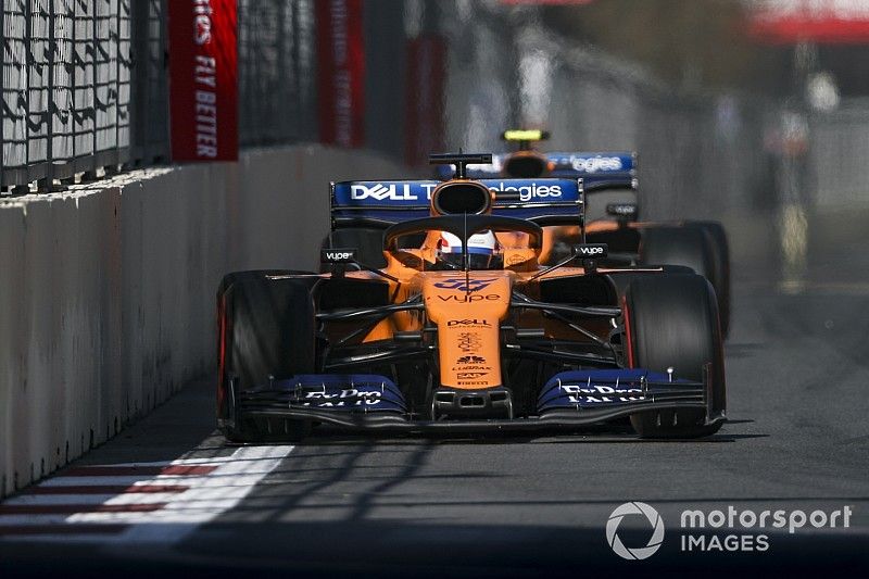 Carlos Sainz Jr., McLaren MCL34, leads Lando Norris, McLaren MCL34
