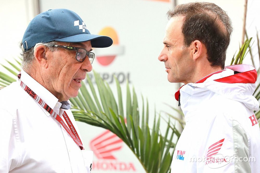 Carmelo Ezpeleta, director general de Dorna Sports, Alberto Puig, director del equipo Repsol Honda Team