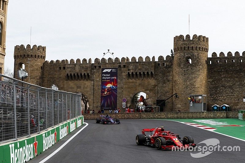 Kimi Raikkonen, Ferrari SF71H, Brendon Hartley, Toro Rosso STR13 Honda