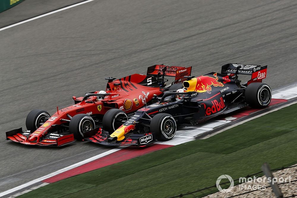 Sebastian Vettel, Ferrari SF90 and Max Verstappen, Red Bull Racing RB15 battle 