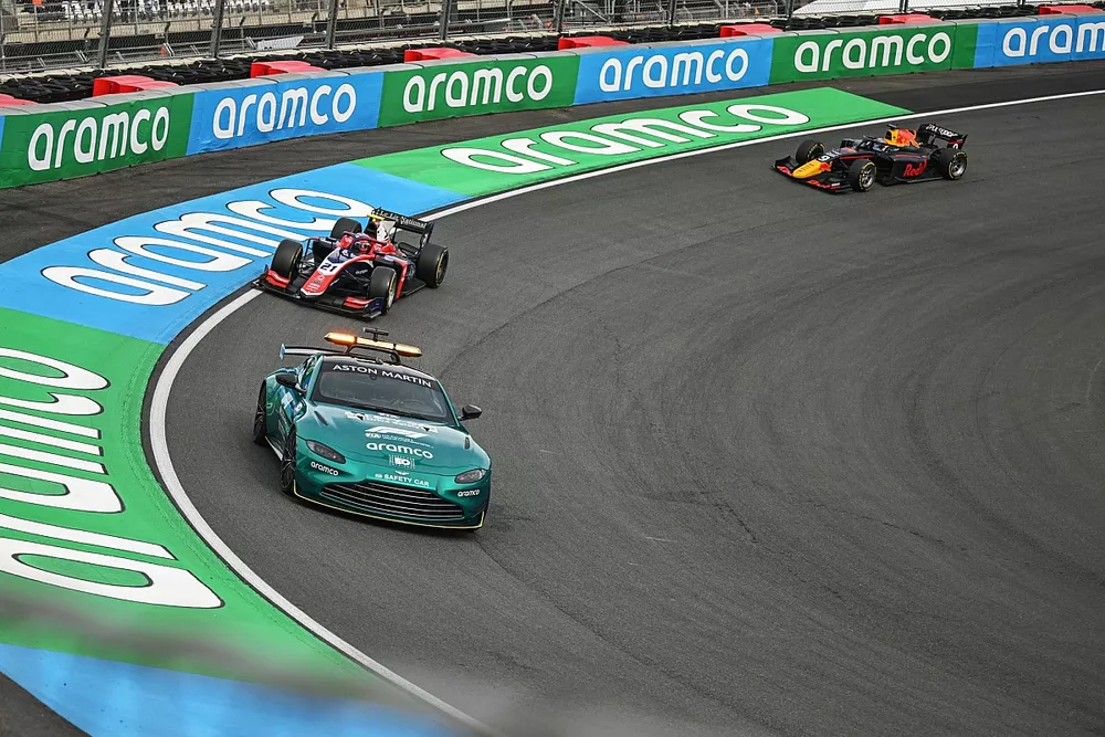 The Aston Martin Vantage Safety Car leads Clement Novalak, Trident