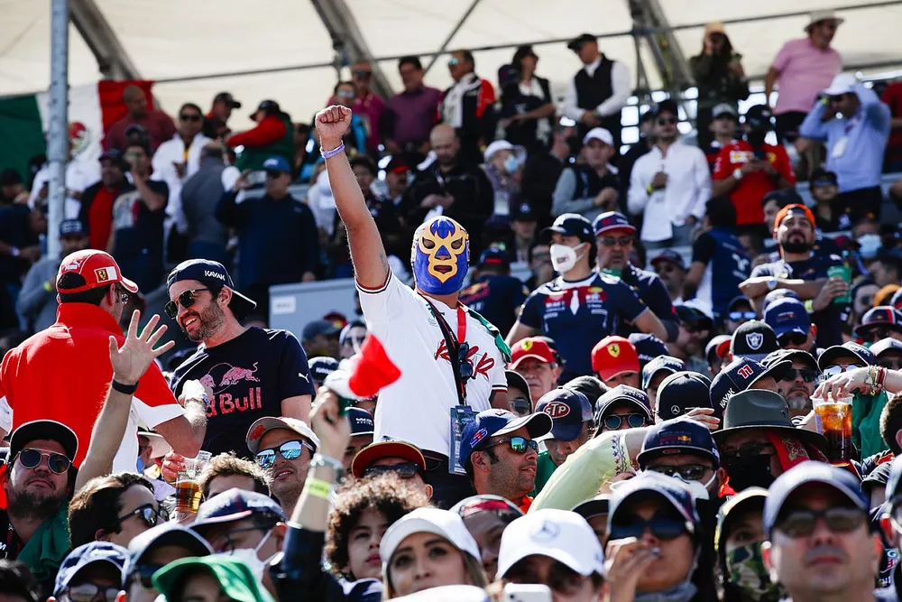 A fan in a Luchador mask in the crowd