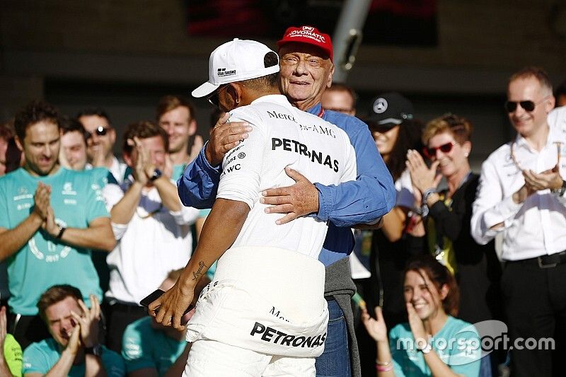 Lewis Hamilton, Mercedes AMG F1, Niki Lauda, Non-Executive Chairman, Mercedes AMG F1, celebrate Constructors' Championship victory with the rest of the team