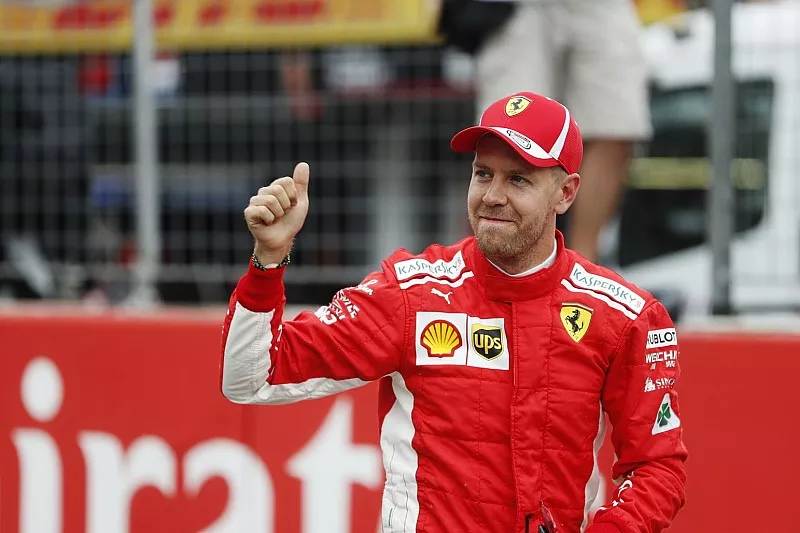 Sebastian Vettel, Ferrari, celebrates his pole position