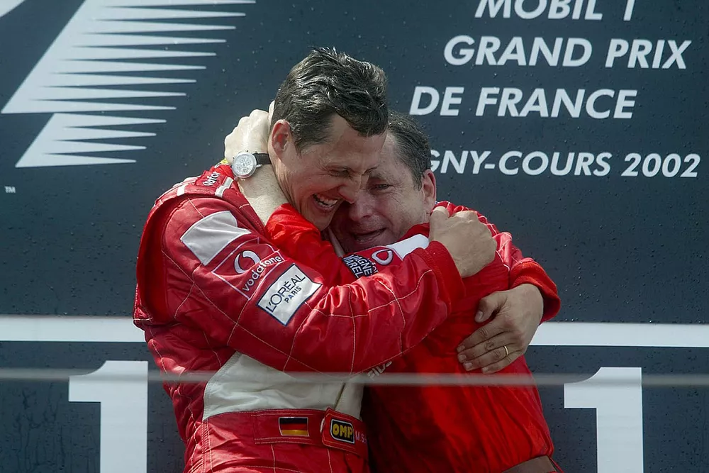 Podium: race winner Michael Schumacher, Ferrari celebrates with Jean Todt, Ferrari