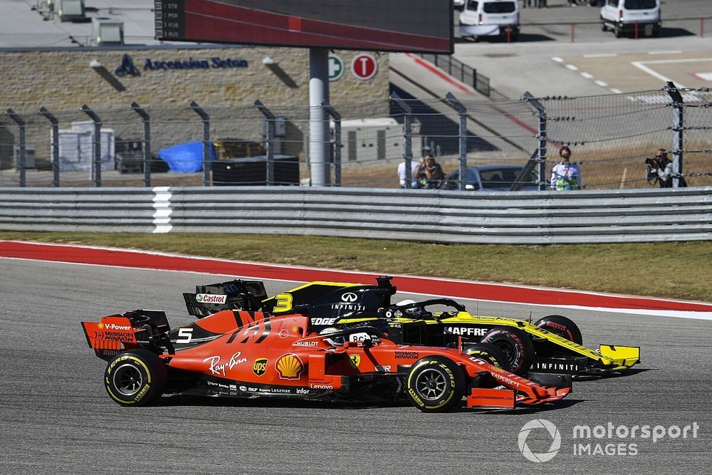 Sebastian Vettel, Ferrari SF90, battles with Daniel Ricciardo, Renault F1 Team R.S.19