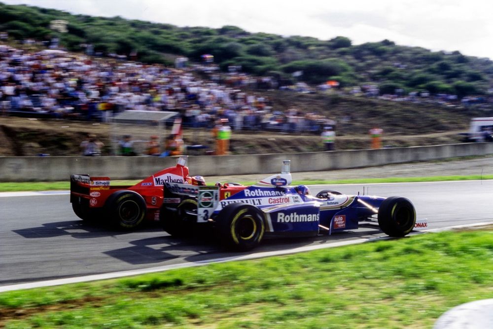 De controversi&euml;le botsing tussen Michael Schumacher, Ferrari F310B, en Jacques Villeneuve, Williams FW19 Renault