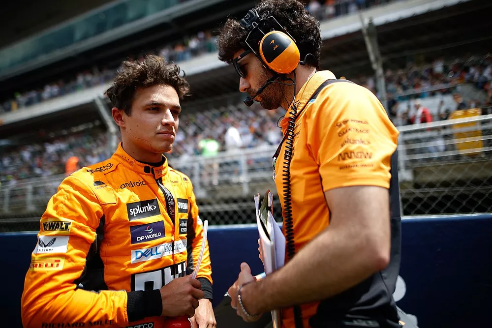 Lando Norris, McLaren, on the grid with his engineer
