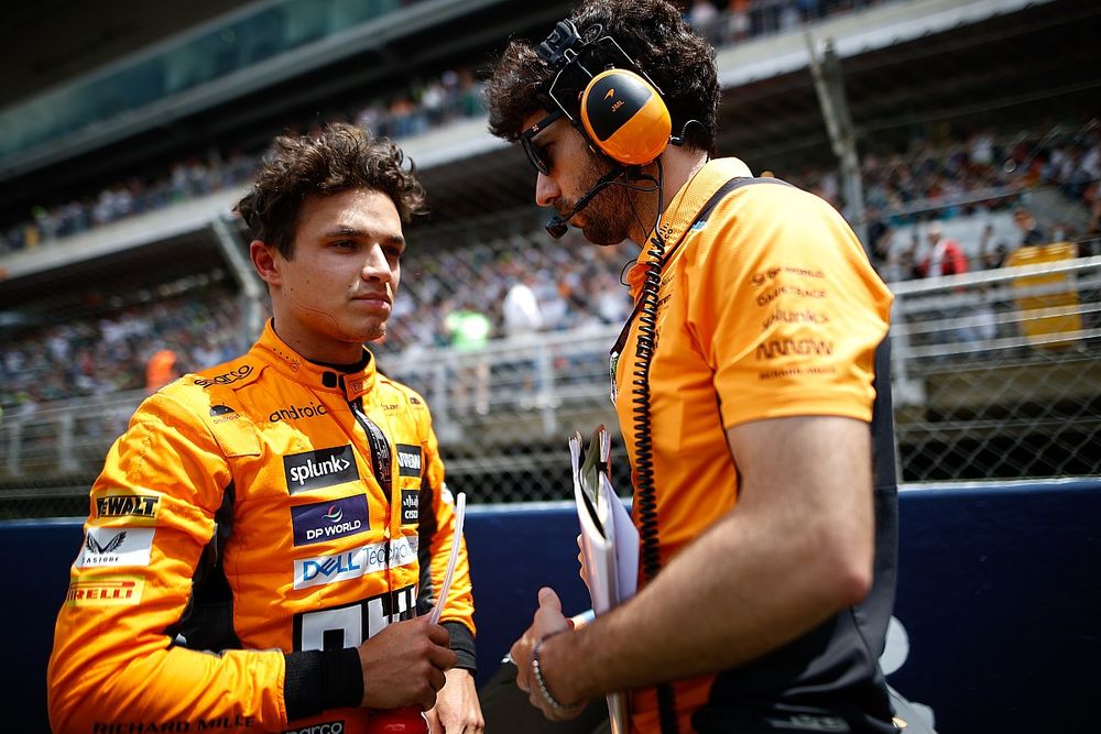 Lando Norris, McLaren, on the grid with his engineer