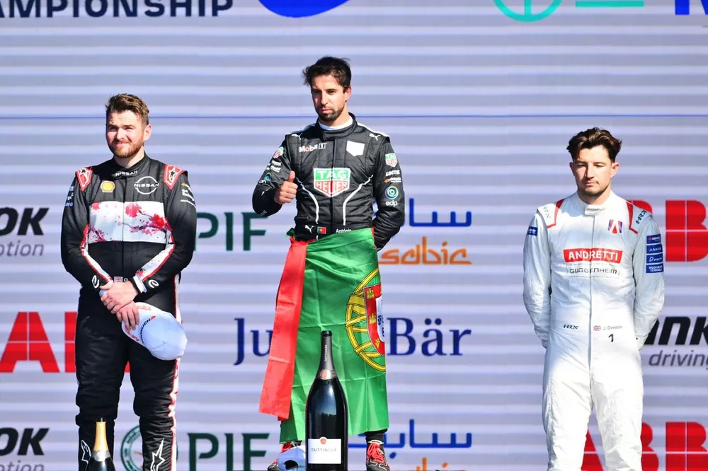 Oliver Rowland, Nissan Formula E Team, 2nd position, Antonio Felix da Costa, Porsche, 1st position, Jake Dennis, Andretti Global, 3rd position, on the podium