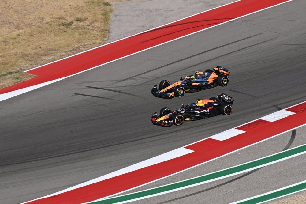 Lando Norris, McLaren MCL38, battles with Max Verstappen, Red Bull Racing RB20 