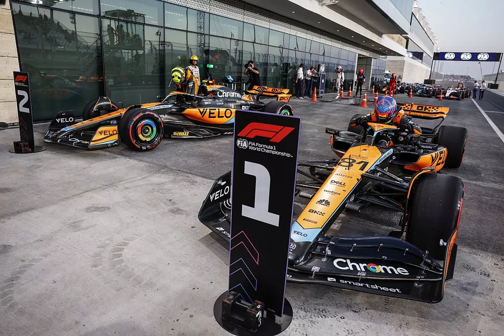 Sprint pole winner Oscar Piastri, McLaren MCL60, Lando Norris, McLaren MCL60, arrive in Parc Ferme after the Sprint Shootout