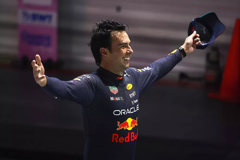 Sergio Perez, Red Bull Racing, 1st position, celebrates in Parc Ferme