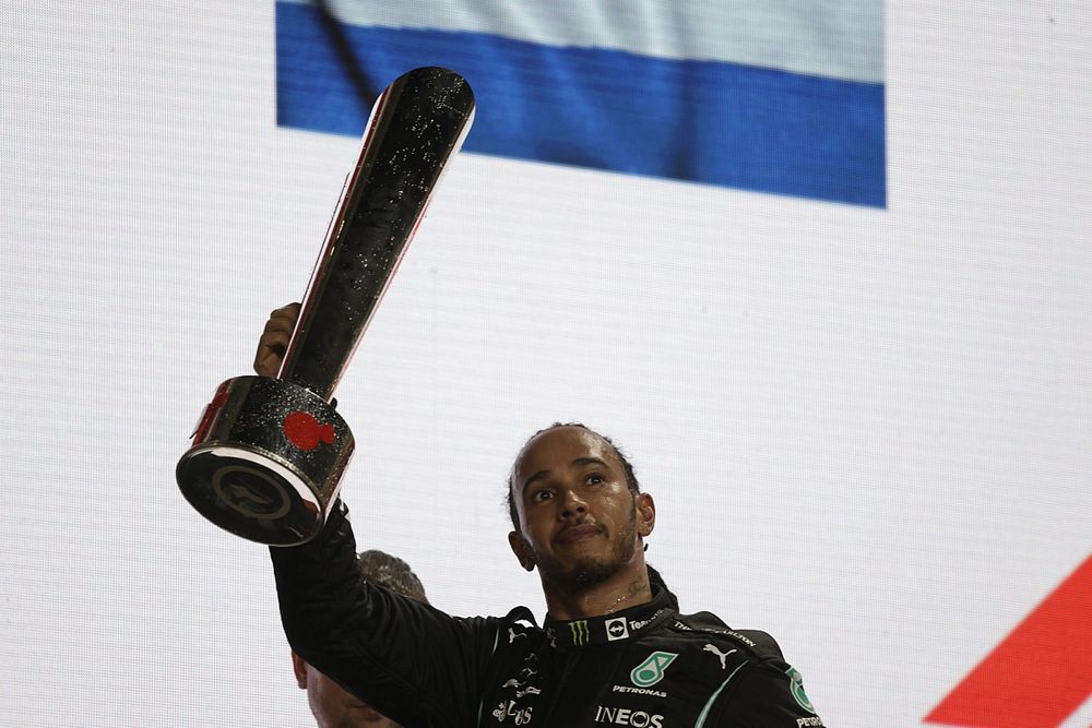 Lewis Hamilton, Mercedes, 1st position, lifts his trophy