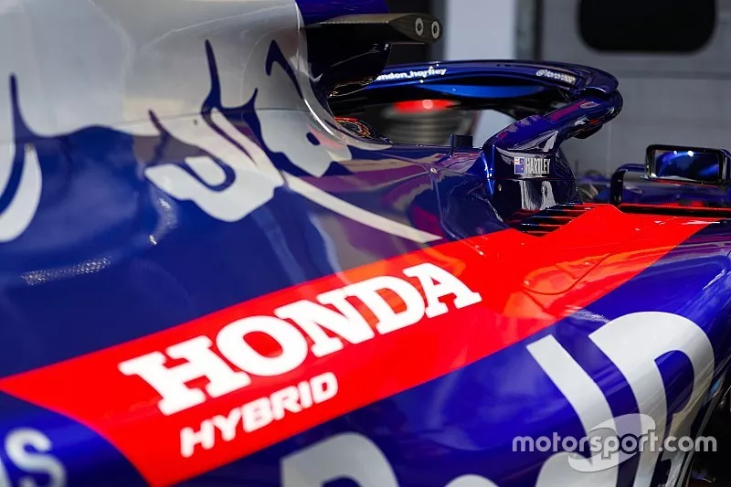 A Honda logo on Toro Rosso bodywork