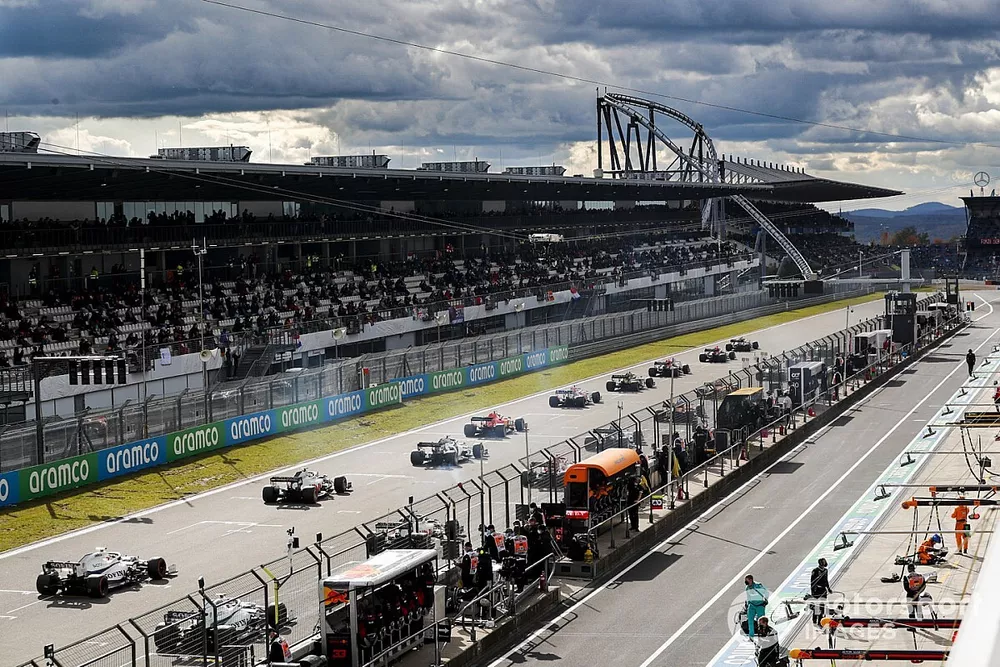 Cars line up on the grid before the start of the race