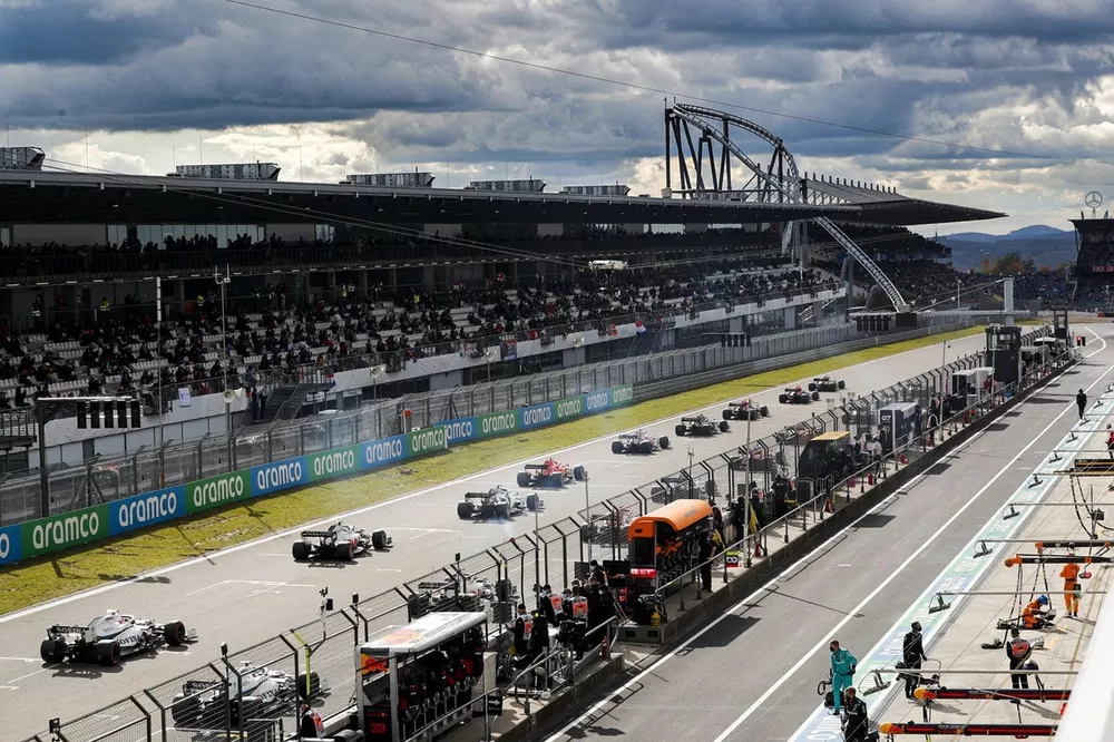 Cars line up on the grid before the start of the race