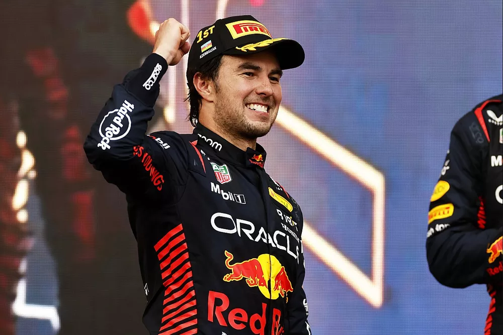 Sergio Perez, Red Bull Racing, 1st position, arrives on the podium