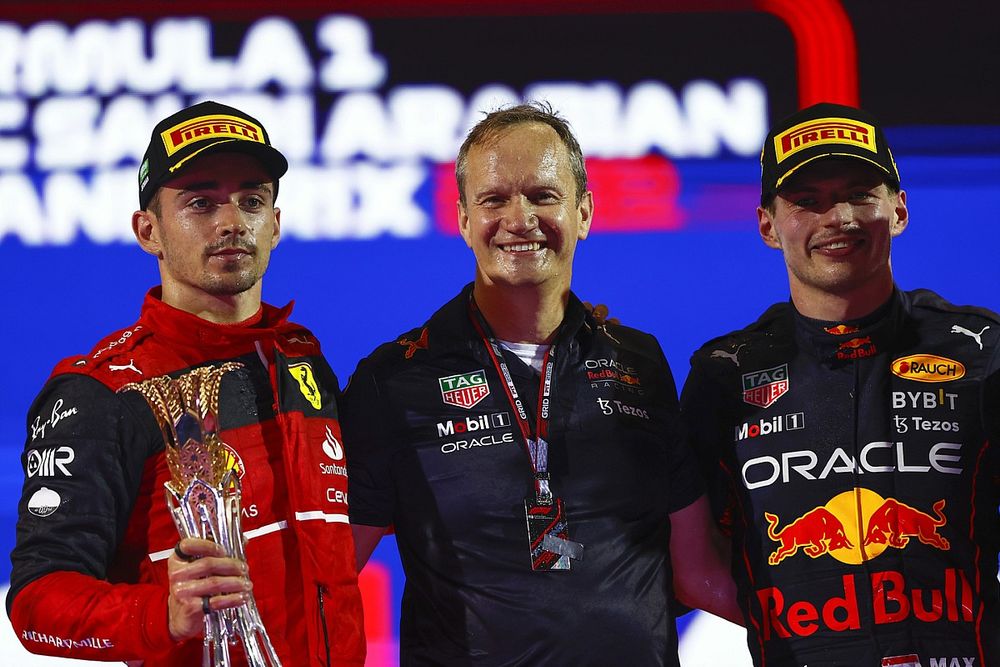 Charles Leclerc, Ferrari, 2nd position, Paul Monaghan, Chief Engineer, Red Bull Racing, Max Verstappen, Red Bull Racing, 1st position, on the podium