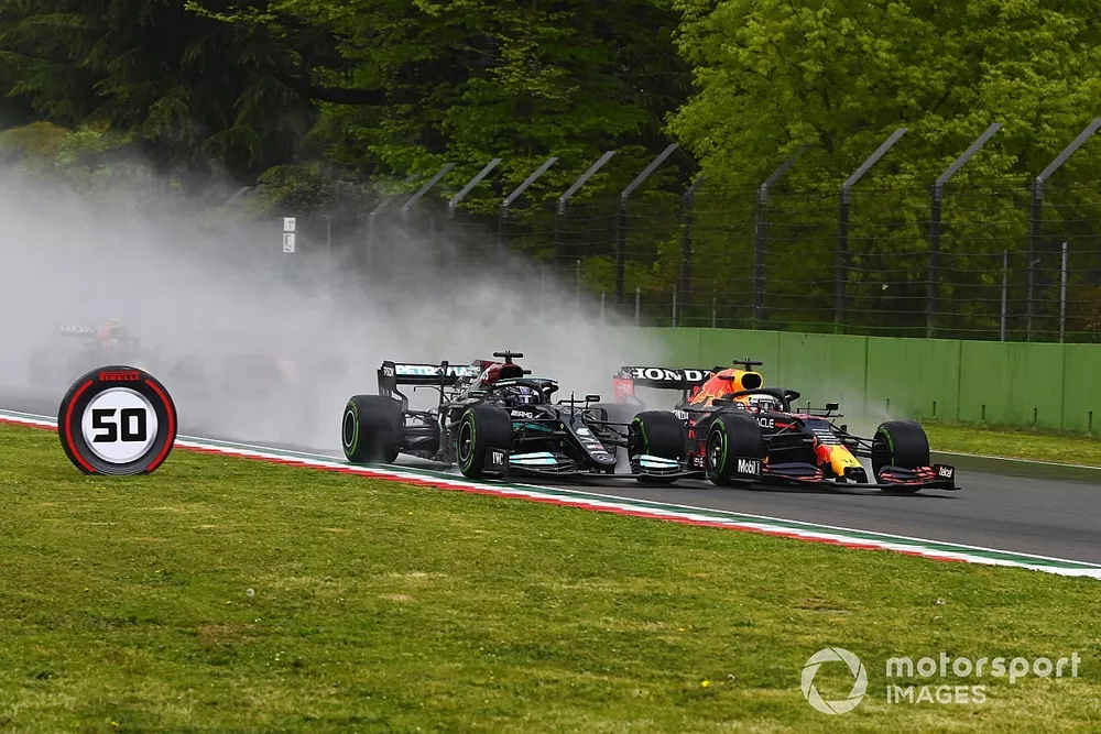 Lewis Hamilton, Mercedes W12, battles with Max Verstappen, Red Bull Racing RB16B 