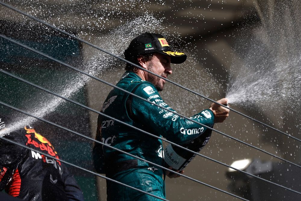 Fernando Alonso, Aston Martin F1 Team, 3rd position, sprays Champagne on the podium