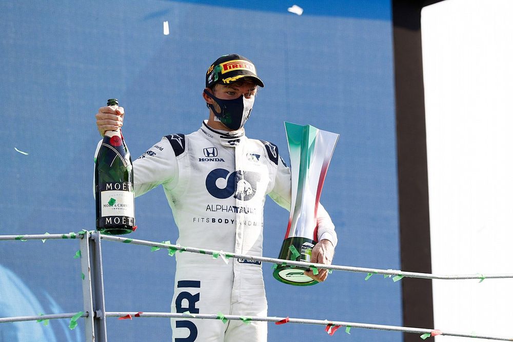 Pierre Gasly, AlphaTauri, 1st position, on the podium with his trophy and Champagne
