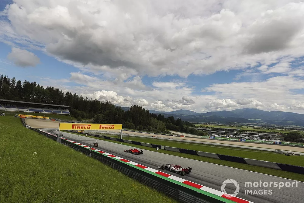 Sebastian Vettel, Ferrari SF1000, leads Antonio Giovinazzi, Alfa Romeo Racing C39