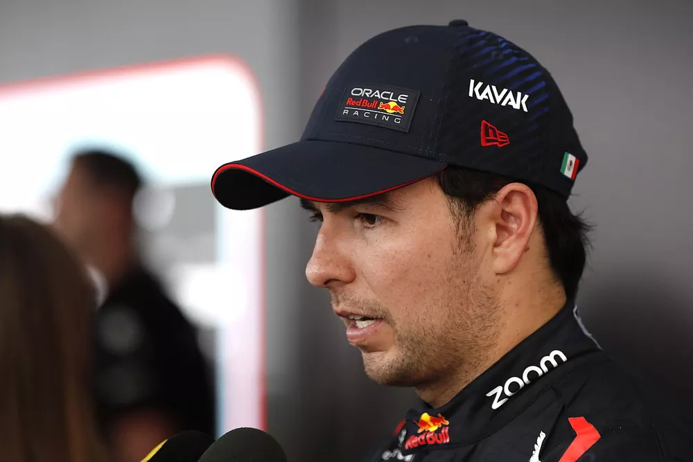 Sergio Perez, Red Bull Racing, is interviewed on the podium