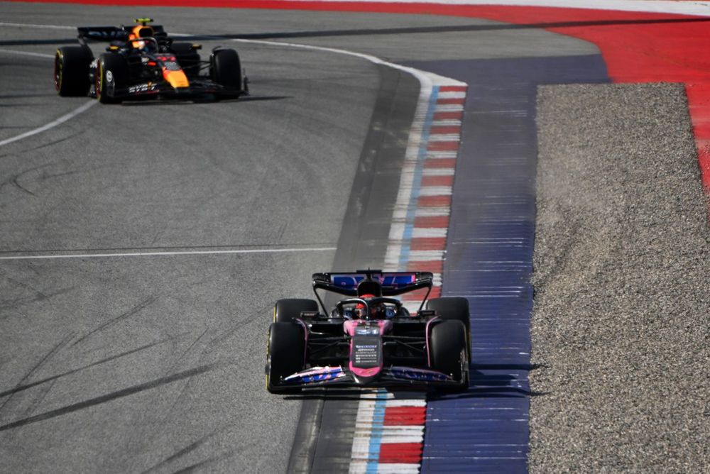Esteban Ocon, Alpine A524, leads Sergio Perez, Red Bull Racing RB20