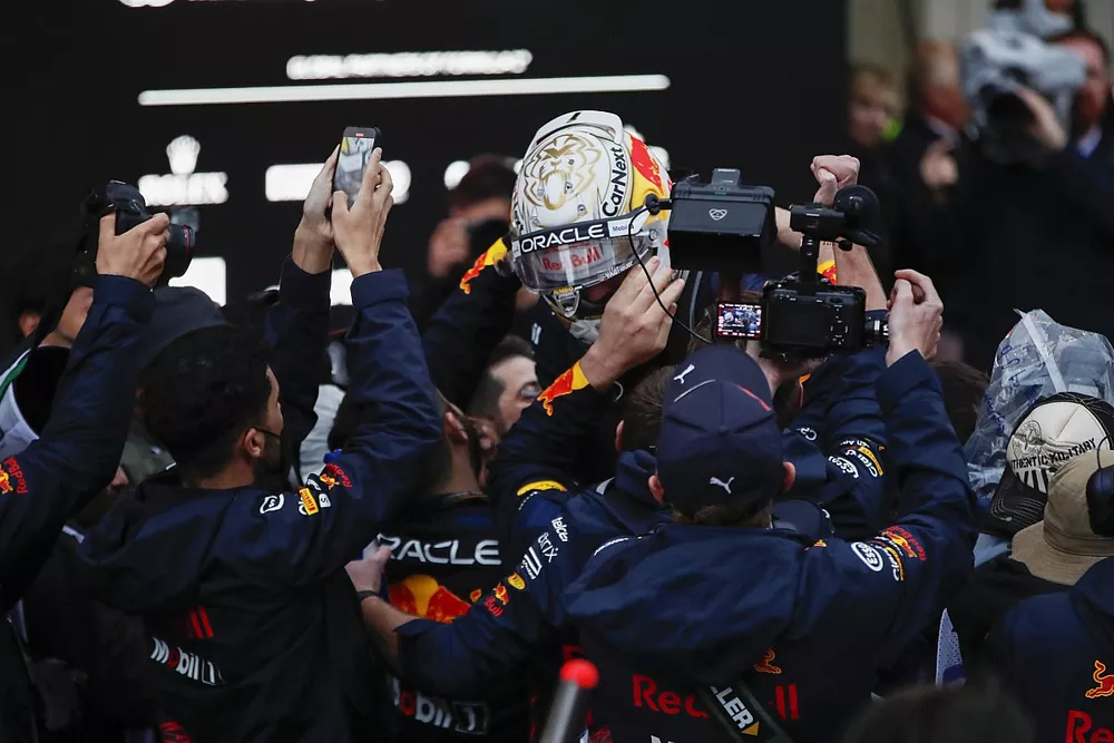 Max Verstappen, Red Bull Racing, 1st position, celebrates with his team in Parc Ferme