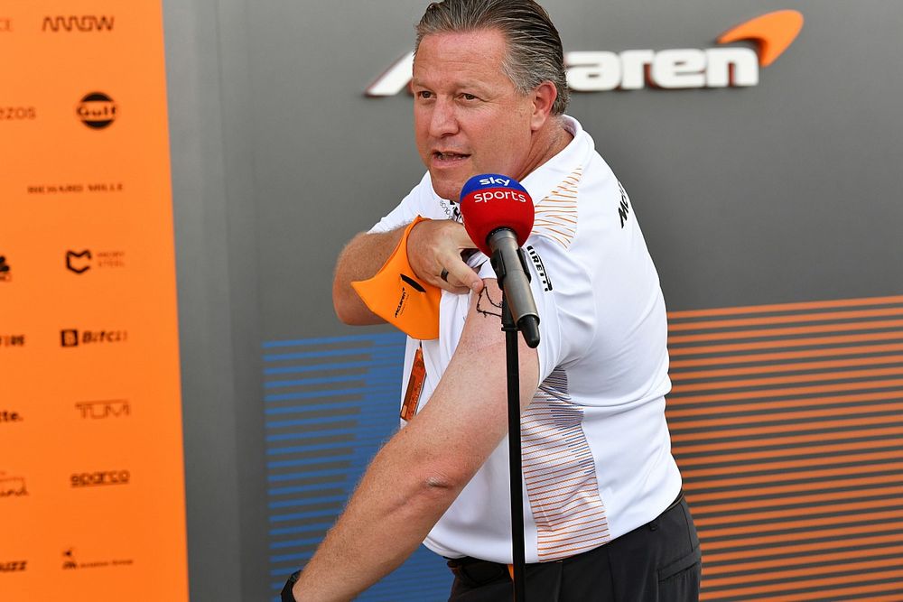 Zak Brown, CEO, McLaren Racing, shows off his new Monza tattoo